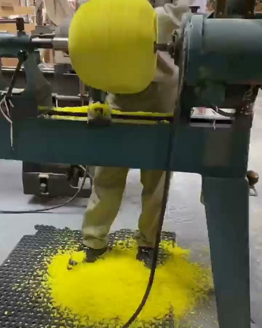 Turning a BOUNCE ball, yellow shavings on the floor